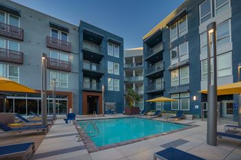 Relaxing resort-style pool with sundeck and spa